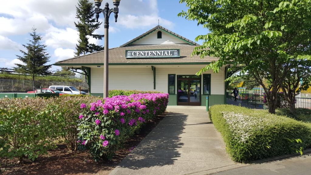 Flowering hedge in front of Centennial Station.