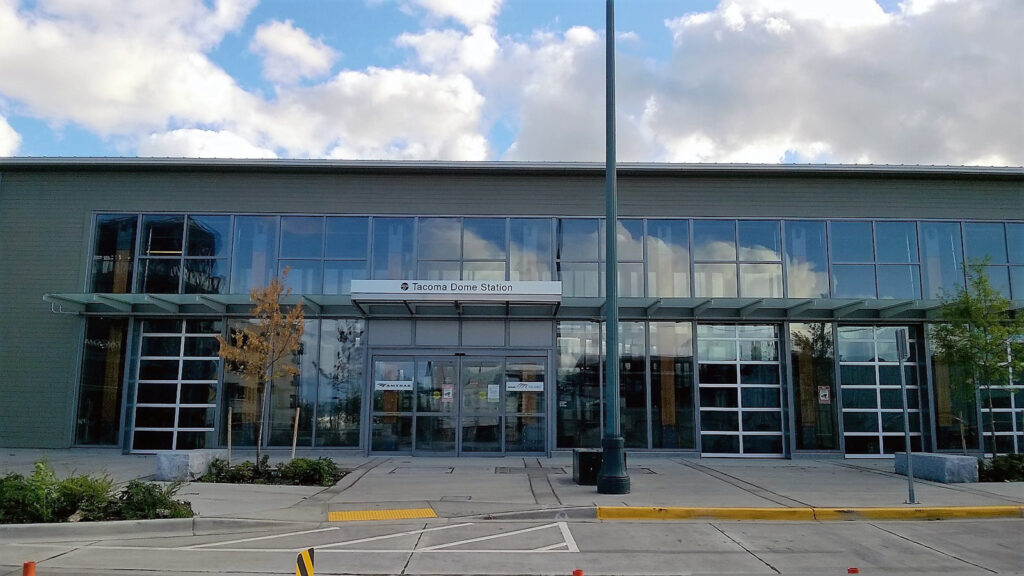 The front wall of the Tacoma Dome Station, which is made mostly of windows.